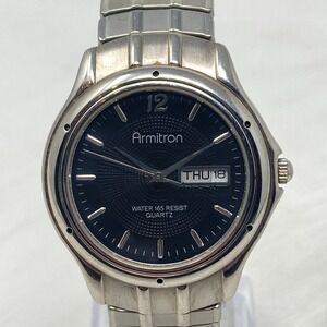 Armitron Watch Men 34mm Silver Tone Black Dial Day Date Stretch Band New Batt 7"